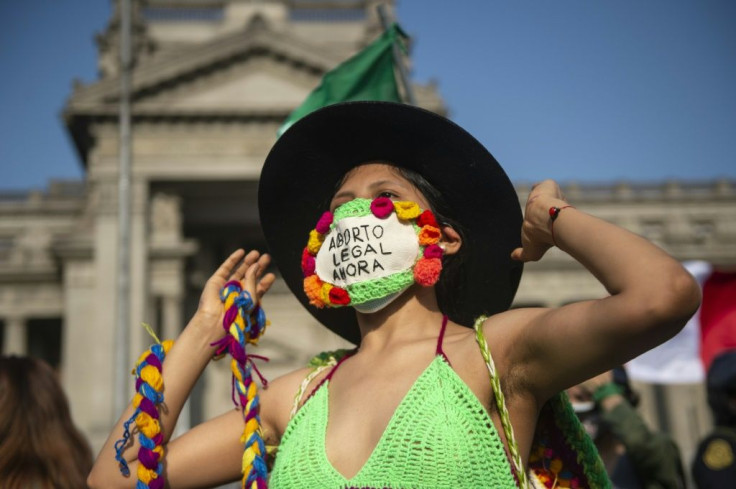 Activists demanding abortion rights rally outside the Justice Palace in Lima