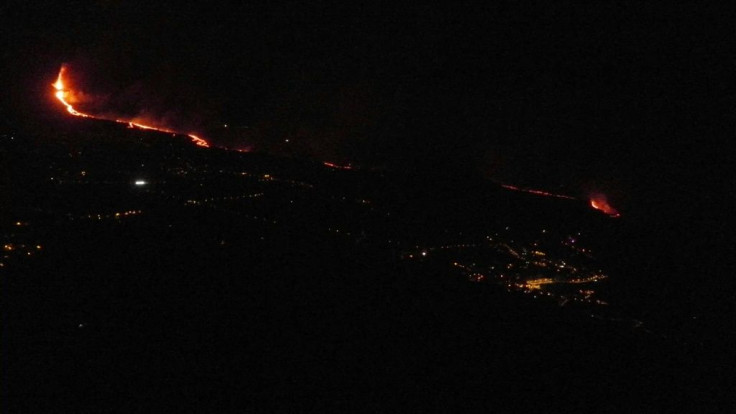 Lava from an erupting volcano in the Canary Islands reaches the ocean, raising fears of toxic gases being released as the molten magma hits the seawater.