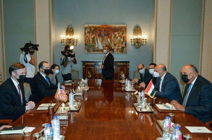 A handout picture released by the Egyptian Ministry of Foreign Affairs shows Egypt's Foreign Minister Sameh Shoukri (R) meeting with US National Security Adviser Jake Sullivan (L) in Cairo on September 29, 2021