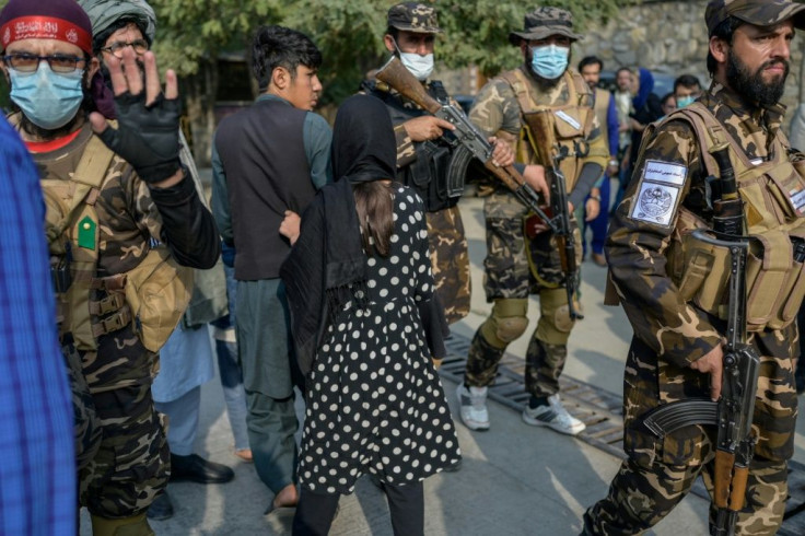 The Taliban pushed back women protesters as they tried to continue with the small demonstration in Kabul, while a foreign journalist was hit with a rifle and blocked from filming