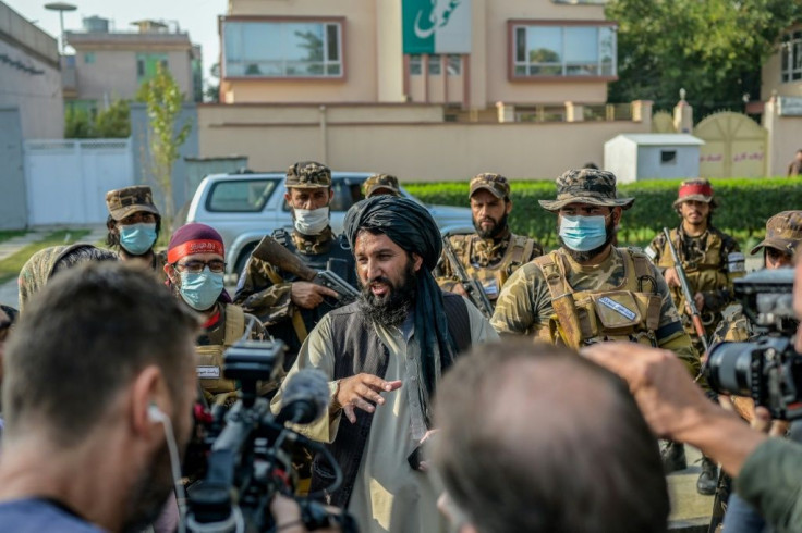 The demonstrators -- from a group called the "Spontaneous Movement of Afghan Women Activists" -- took refuge inside the school