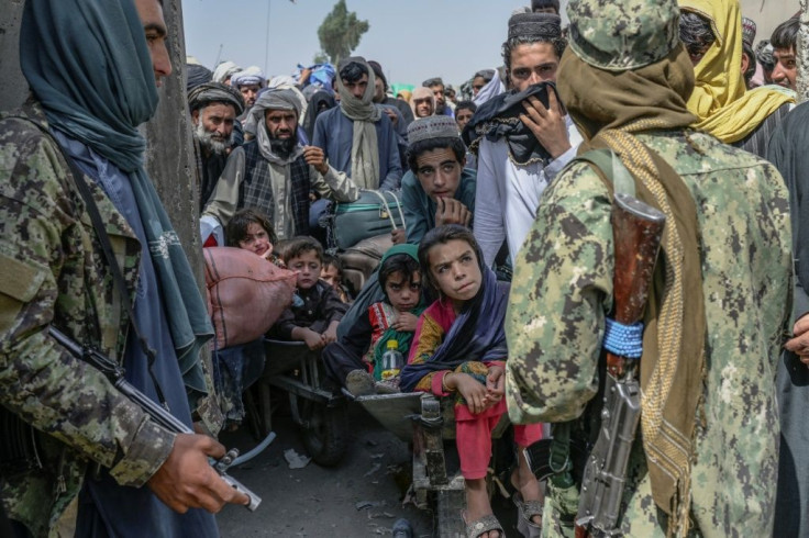The new Taliban rulers insist Afghans need to stay and rebuild their conflict-ravaged country