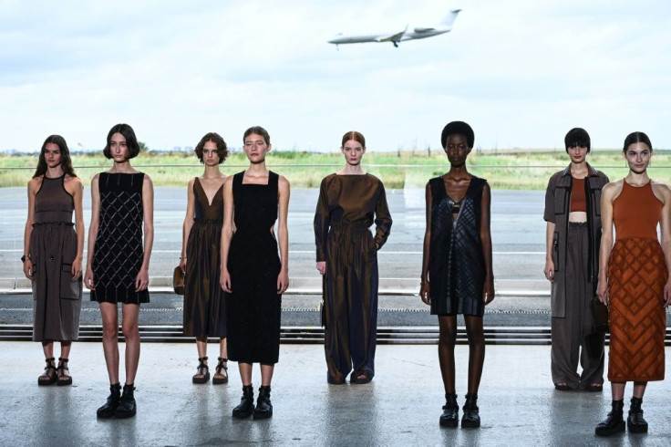 Hermes did not go for an ecological vibe, setting their show in an airport hangar outside Paris