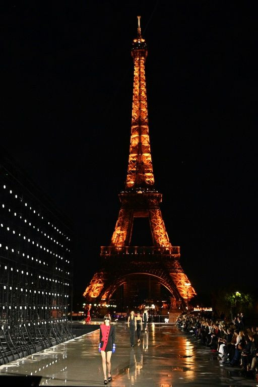 Yves Saint Laurent went for a traditional approach, returning to its favourite location in front of the Eiffel Tower