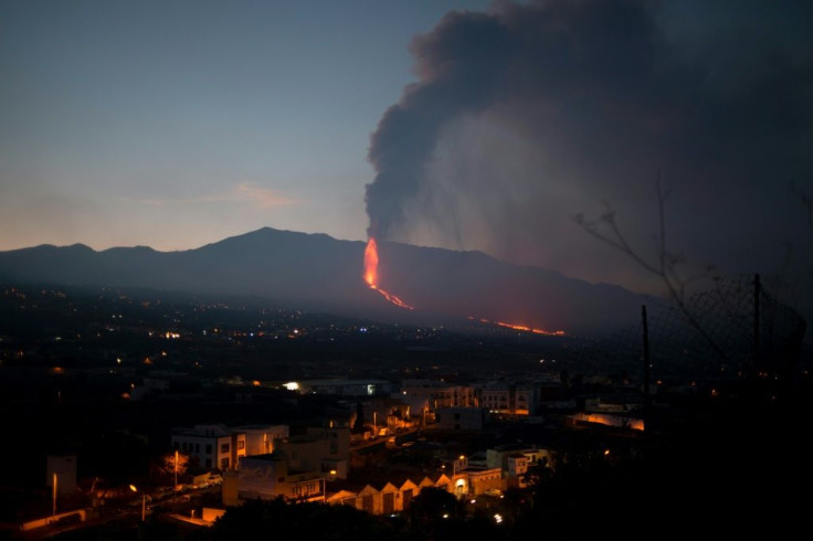 Despite the Cumbre Vieja volcano spewing lava, ash and smoke as here in Los Llanos de Aridane on La Palma, life is continuing almost as normal in much of the island