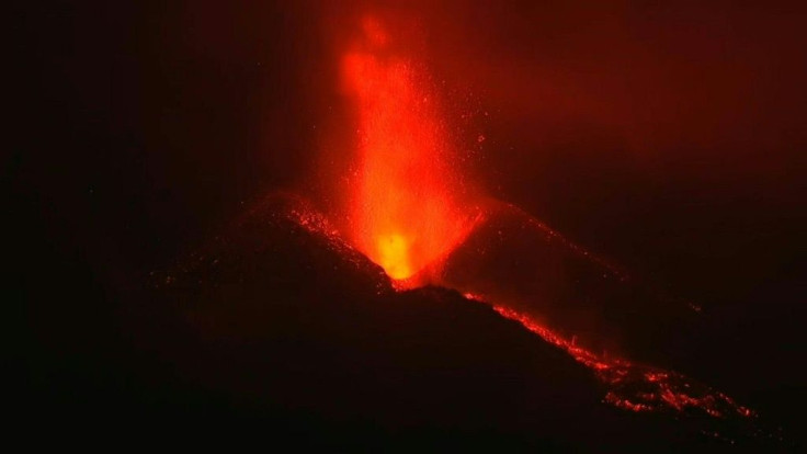 Lava continues to spew from the Cumbre Vieja volcano overnight on Spain's La Palma island, two weeks after the start of its first eruption in 50 years.