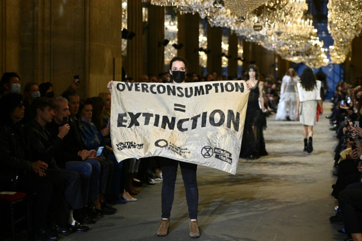 The protesters were highlighted overconsumption in the fashion industry