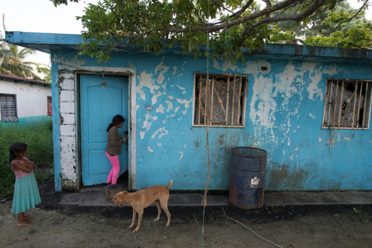 At the only school in Ologa, the paint is peeling off the walls and dust has piled up inside the classrooms during a four year closure