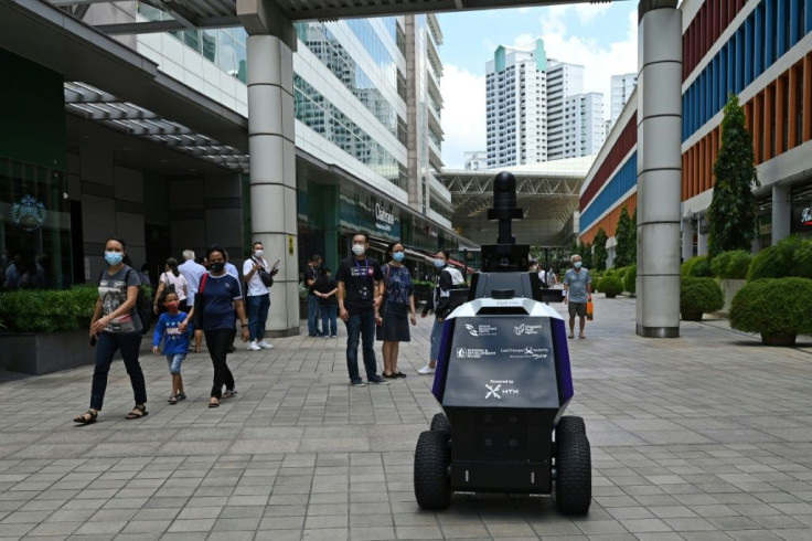During a three-week trial in September, two robots were deployed to patrol a Singapore housing estate and shopping centre