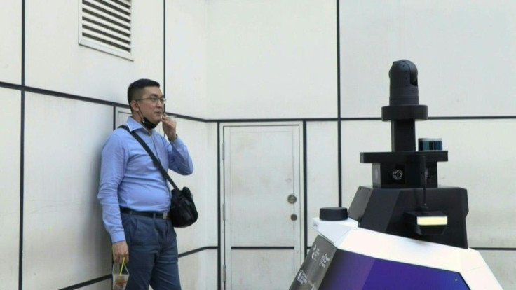 Singapore has trialled patrol robots that blast warnings at people engaging in "undesirable social behaviour", adding to an arsenal of surveillance technology in the tightly controlled city-state.