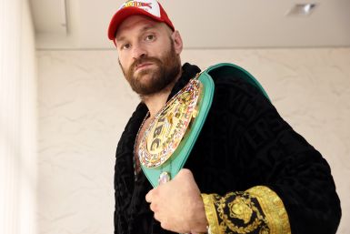 Tyson Fury poses with the WBC heavyweight championship