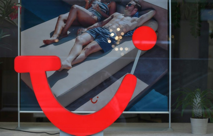 The smile's back: TUI is raising cash to pay down debt as bookings surge amid easing of coronavirus measures