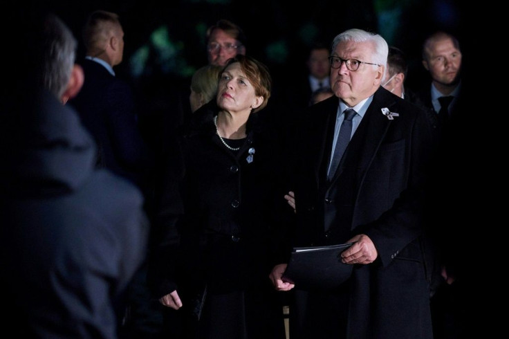 Steinmeier and his wife Elke BÃ¼denbenderin taking part in the Babi Yar memorial ceremony