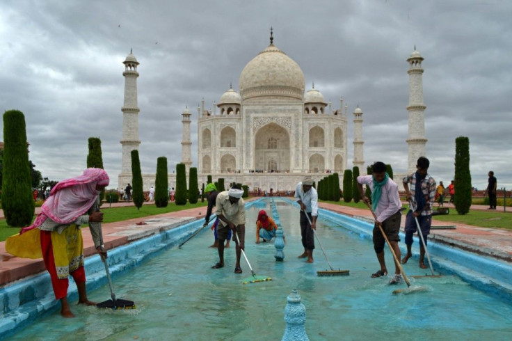 Workers clean a water fountain tank at India's famed Taj Mahal in Agra