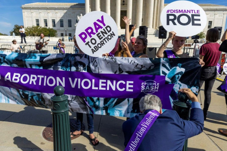 Anti-abortion activists protest outside the US Supreme Court in Washington