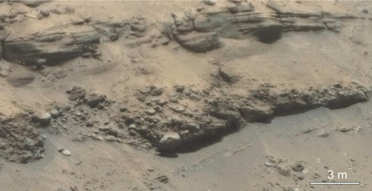 This March 17, 2021, photo obtained from NASA shows a close-up of Jezero Craterâs âDelta Scarpâ taken by NASAâs Perseverance rover. Scientists believe the 377-foot-wide (115-meter) escarpment is remnants of deposit of sediments from the confluence