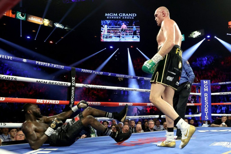 Tyson Fury floors Deontay Wilder during their second fight in Las Vegas last year