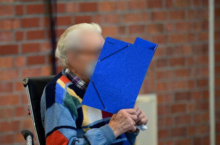 Schuetz is accused of assisting in the murders of 3,518 prisoners