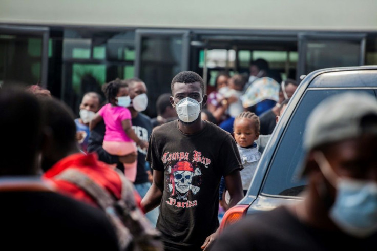 An expelled migrant arrives on September 19, 2021 at the airport in Port-au-Prince, Haiti