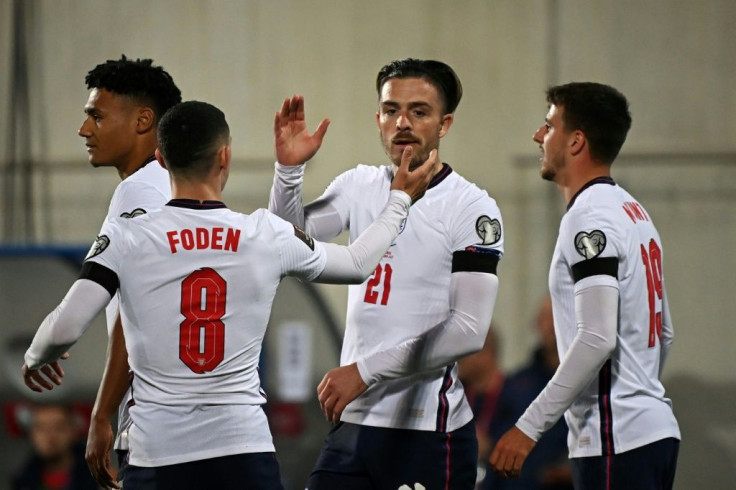 Jack Grealish (C) celebrates his first international goal for England