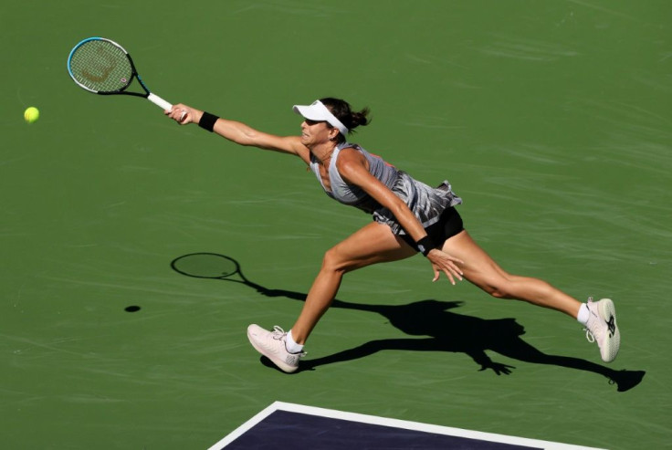 Lean in: Australian Ajla Tomljanovic on the way to a second-round victory over fifth-seeded Garbine Muguruza of Spain at the WTA and ATP Masters Indian Wells hard court tournament