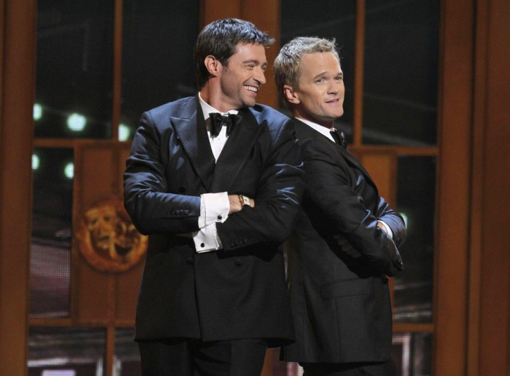 Actor Hugh Jackman performs with host Neil Patrick Harris during the American Theatre Wing&#039;s 65th annual Tony Awards ceremony in New York, June 12, 2011.