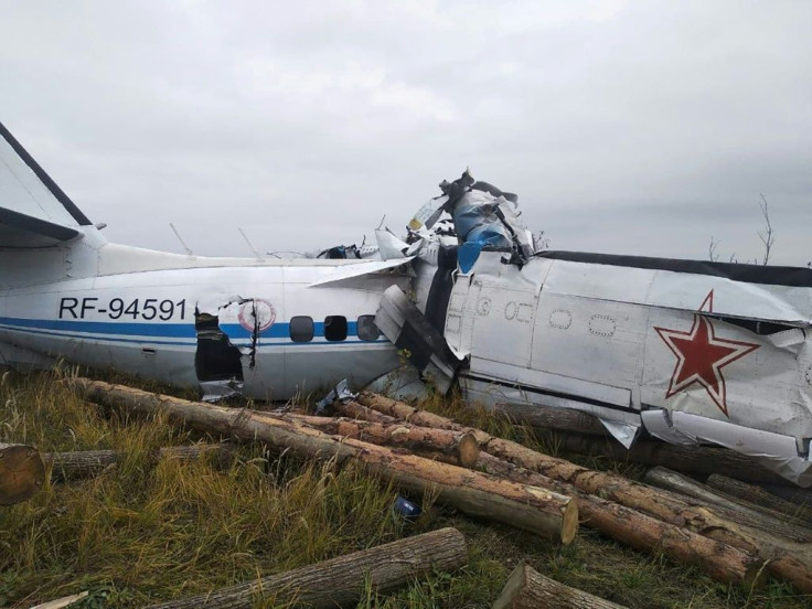 Images published by the emergencies ministry showed the aircraft broken in half