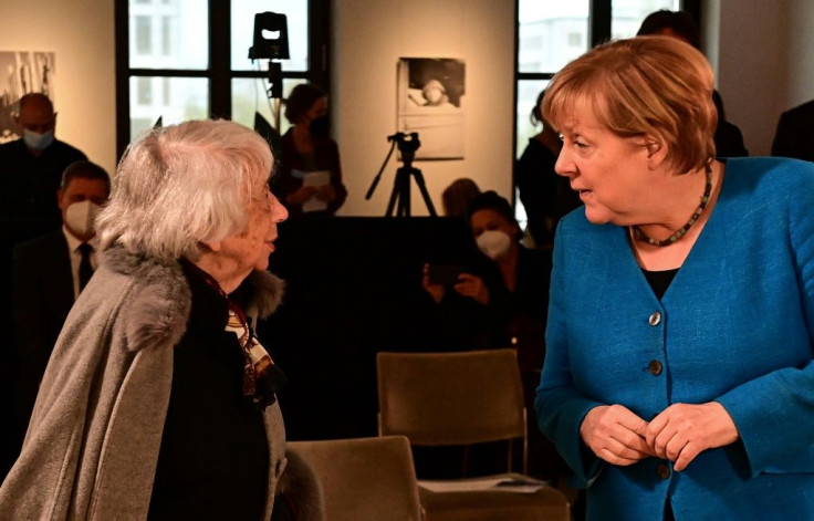 German Chancellor Angela Merkel and Holocaust survivor Margot Friedlaender chat at the Margot Friedlaender Prize 2021 award ceremony to honor young commitment against anti-Semitism, in Berlin on September 20
