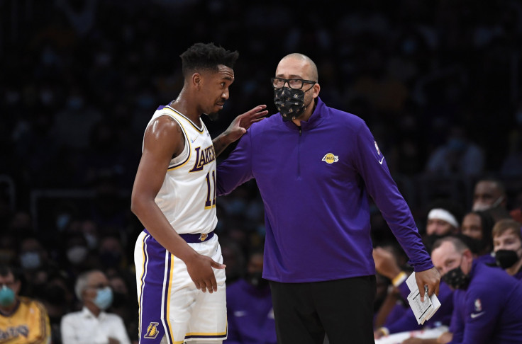 Assistant coach David Fizdale talks with Malik Monk #11 of the Los Angeles Lakers