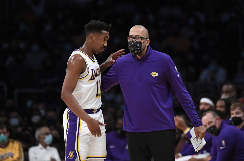 Assistant coach David Fizdale talks with Malik Monk #11 of the Los Angeles Lakers