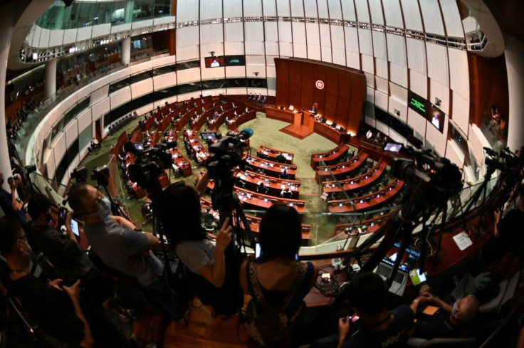 The number of directly elected seats in Hong Kong's legislature has been reduced from half to less than a quarter