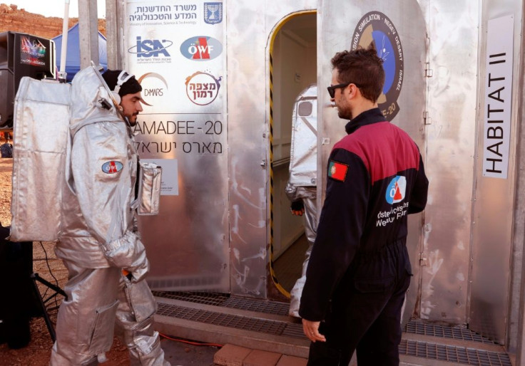 An astronaut from the team enters the sealed habitat, to be supervised by a Mission Support Center in Austria