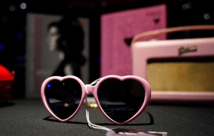 Heart-shaped sunglasses that belonged to Amy Winehouse were displayed in New York ahead of an auction of the star's personal effects in November