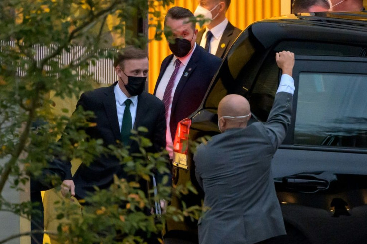 US National Security Advisor Jake Sullivan (L) leaves the Hyatt hotel in Zurich where top US and Chinese officials held talks on October 6, 2021
