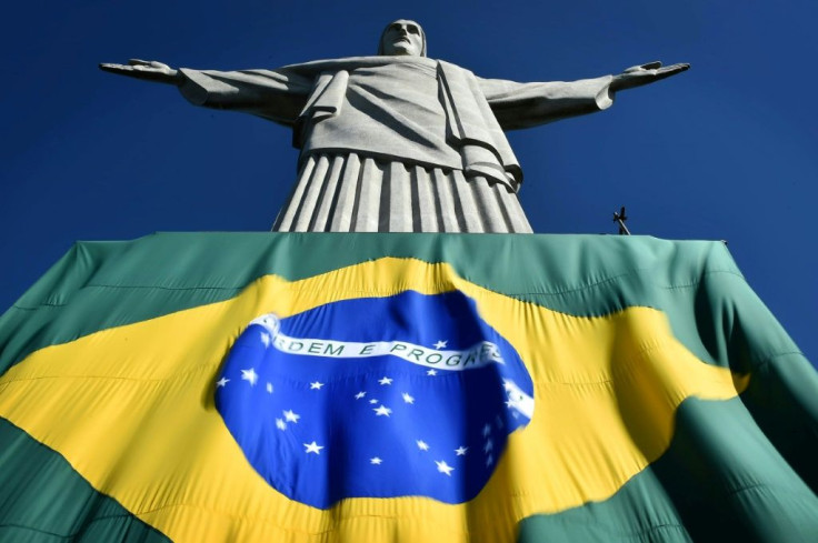 "We ... are used to looking to Christ who is often hidden in the clouds, but we know he is there," a Brazilian priest said on the 90th anniversary of the Christ the Redeemer statue