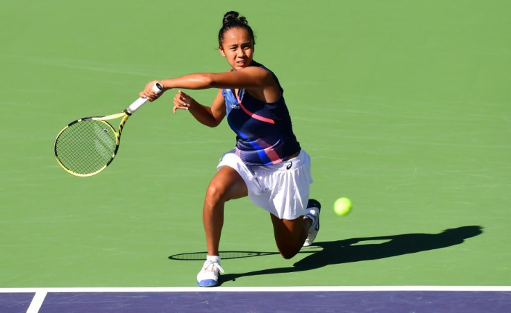 US Open runner-up Leylah Fernandez of Canada hits a forehand return to Shelby Rogers of the US during their fourth round match at ATP-WTA Indian Wells tennis tournament