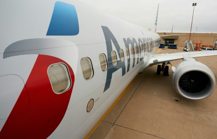 American Airlines said it will defer to federal law over the Texas state law on employer vaccine mandates
