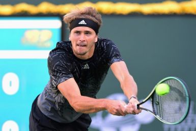 Germany's Alexander Zverev returns a shot to Andy Murray of Great Britain in a third round battle between the two most recent Olympic gold medallists at the ATP Indian Wells tournament in South California