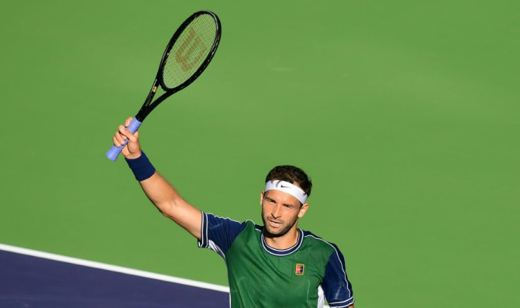 Grigor Dimitrov of Bulgaria celebrates victory over top-seeded Daniil Medvedev of Russia in the fourth round of the ATP Indian Wells Masters