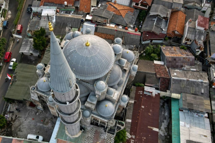 There are around 750,000 mosques across Indonesia -- a medium sized venue could have at least a dozen external loudspeakers that blare the call to prayer five times a day