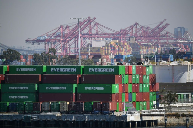 Containers and cranes are seen at the Port of Los Angeles, in California on October 13, 2021