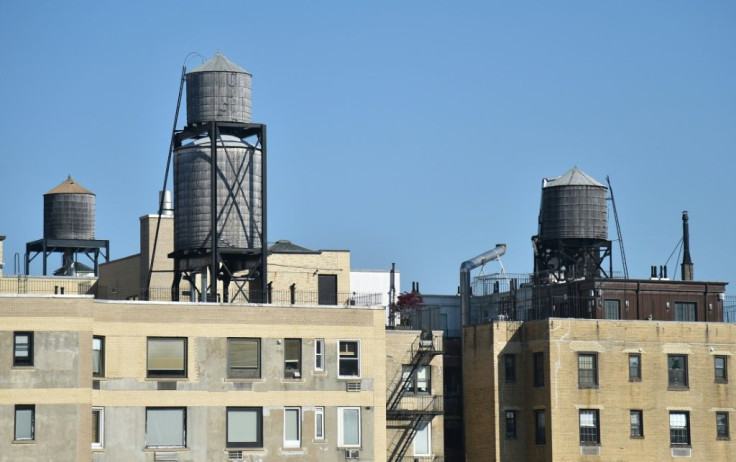 Water tanks, similar to those made by Hall-Woolford, are seen in New York in May 2018