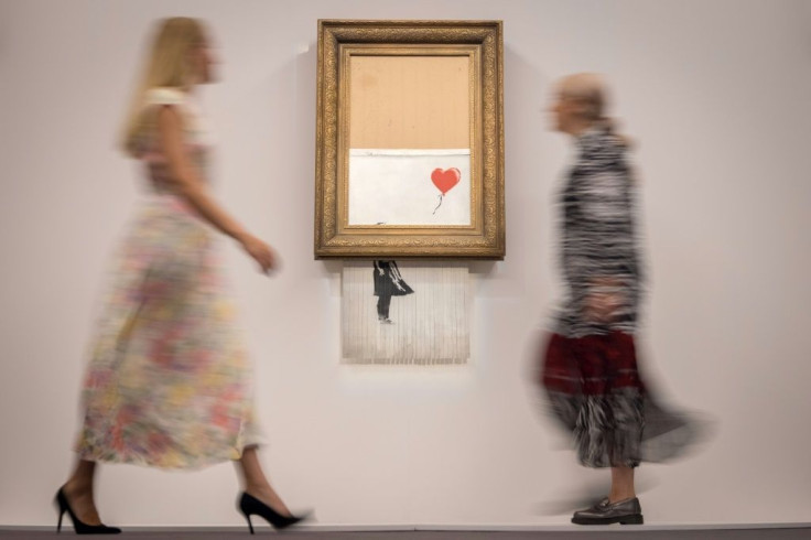 Banksy's partially shredded canvas is expected to sell for between Â£4-6 million ($6-8 million, 5-7 million euros)
