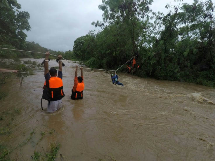 Severe Tropical Storm Kompasu dumped more than a month's worth of rain in two days as it swept across the Philippines