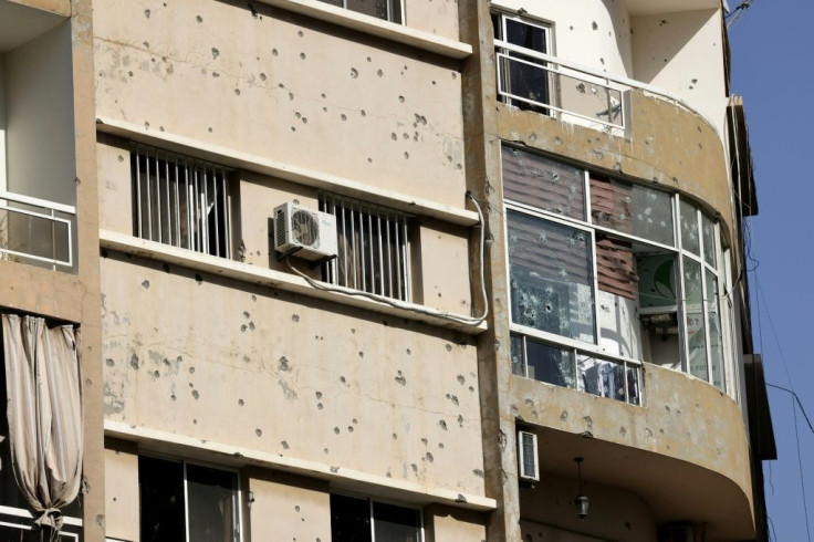 A bullet-riddled building during clashes in the Tayouneh area of Beirut, at the crossroads of Shiite and Christian militia bastions that were also battlegrounds in Lebanon's civil war