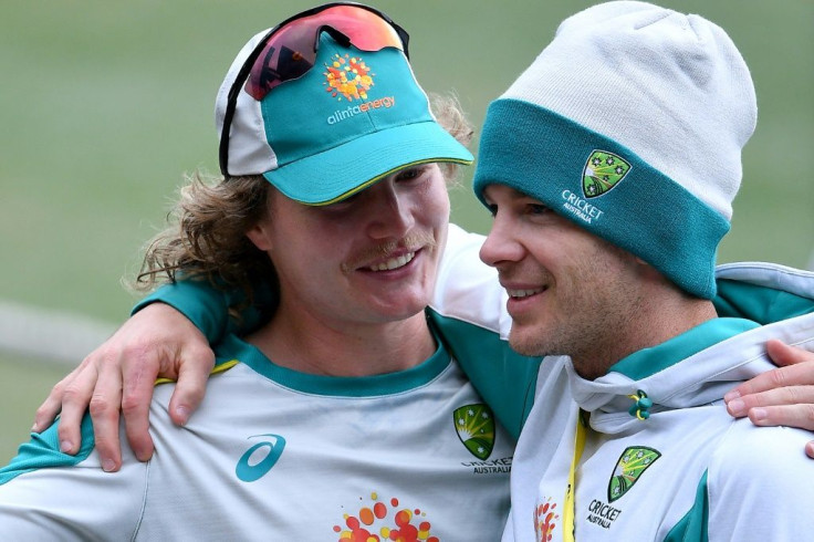 Australia captain Tim Paine is 'devastated' after Will Pucovski (left) suffered another concussion
