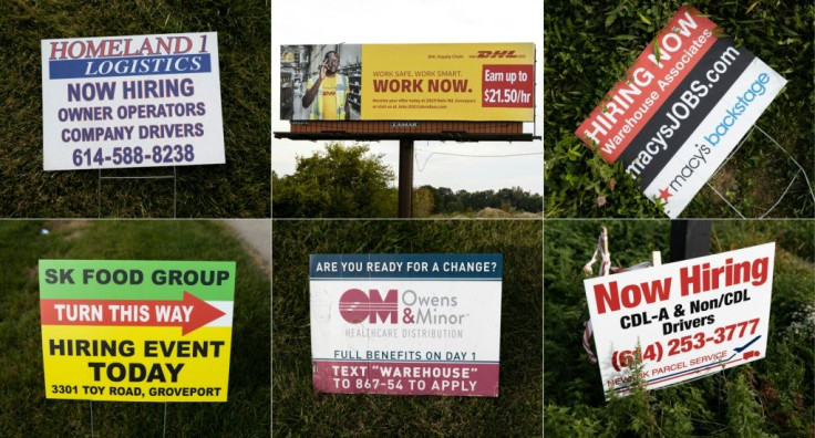 Some of the hiring signs posted around Rickenbacker International Airport in Columbus, Ohio as firms look to recruit scarce workers
