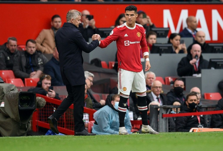 Manchester United manager Ole Gunnar Solskjaer with Cristiano Ronaldo