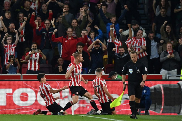 Brentford celebrate scoring against Liverpool