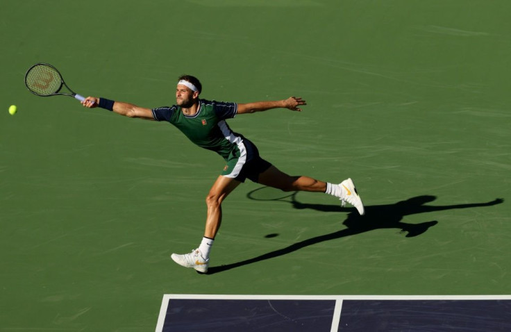 Bulgarian Grigor Dimitrov stretches to play a forehand in his Indian Wells Masters quarter-final victory over Hubert Hurkacz of Poland
